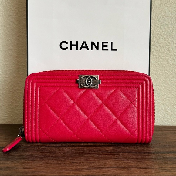 CHANEL Handbags - CHANEL Boy Lambskin Leather Medium Zip Around Wallet in Red